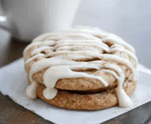 Delicious cinnamon roll cookie with swirled cinnamon filling and sweet frosting topping
