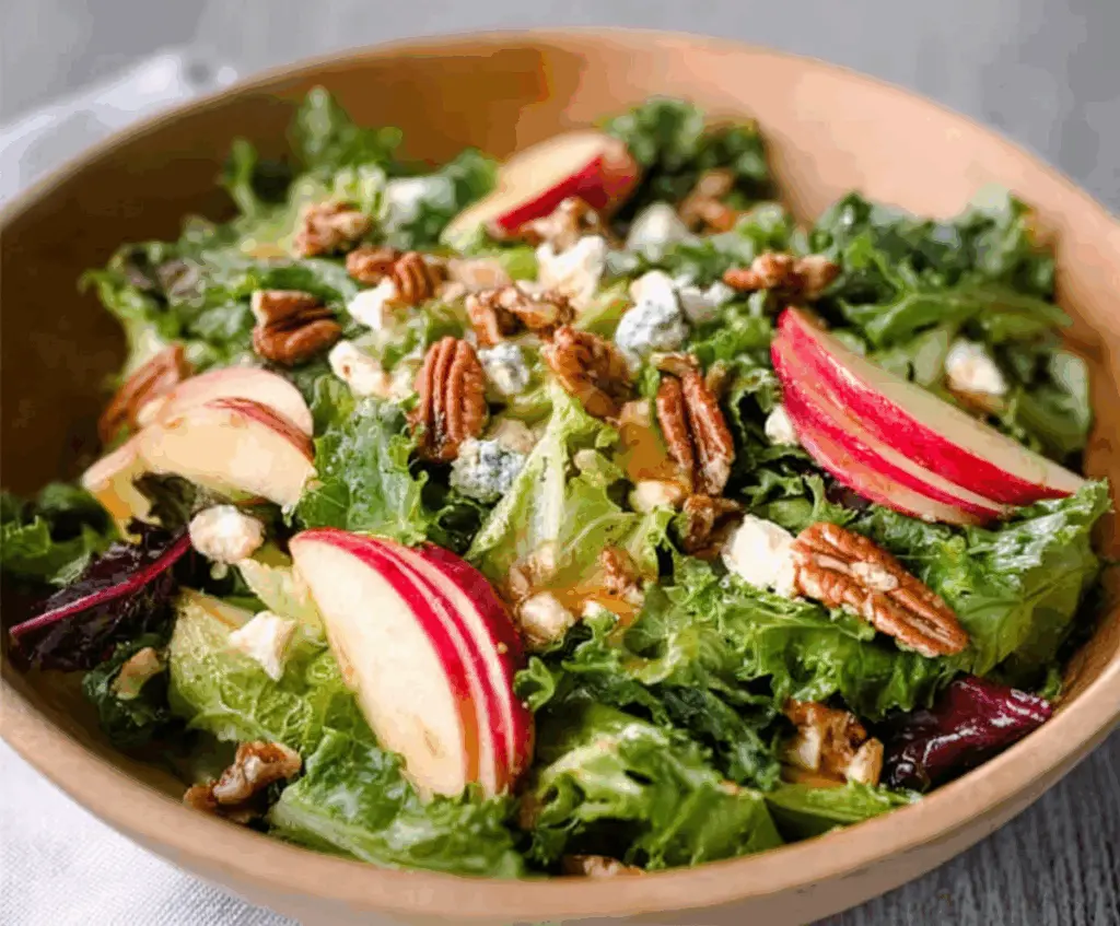 Fresh Honeycrisp Salad with mixed greens, sliced apples, and a honey vinaigrette dressing.