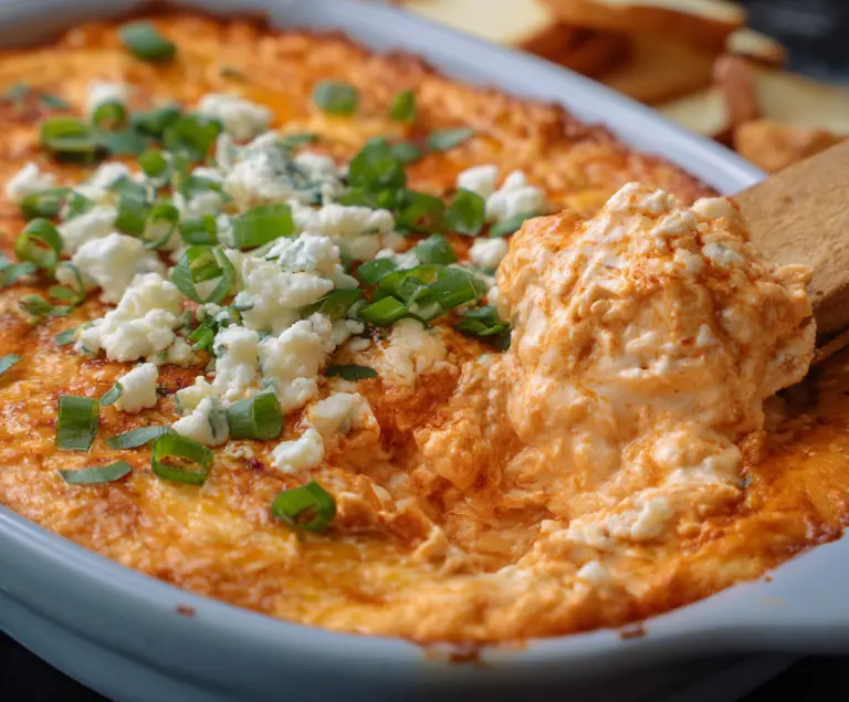 Spicy Frank’s RedHot Buffalo Chicken Dip served in a bowl for a party appetizer.