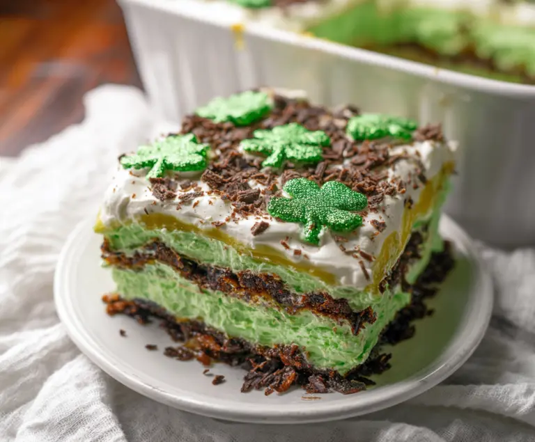 Delicious St. Patrick's Day Shamrock Lasagna Dessert with vibrant green layers and festive decoration.