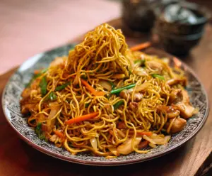 Delicious homemade chow mein with stir-fried noodles, vegetables, and savory sauce.