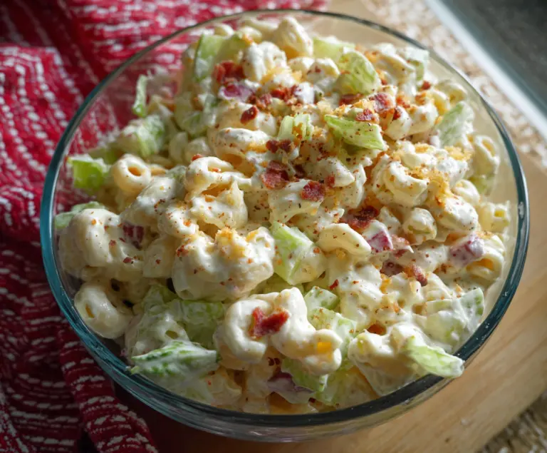 Delicious Guy Fieri's Famous Mac Salad showing creamy pasta with colorful vegetables on a stylish plate.